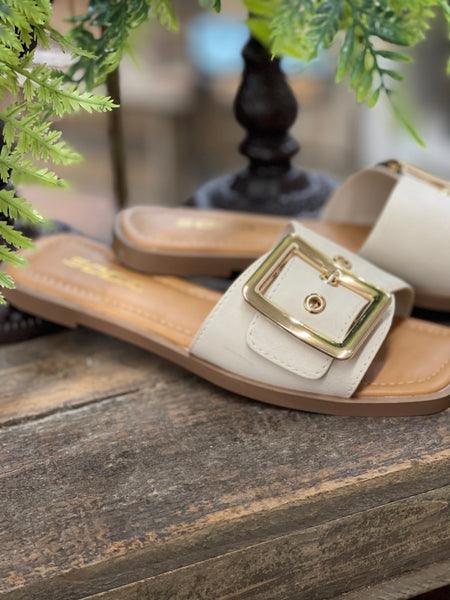 The Apresea Gold Buckle Slide
